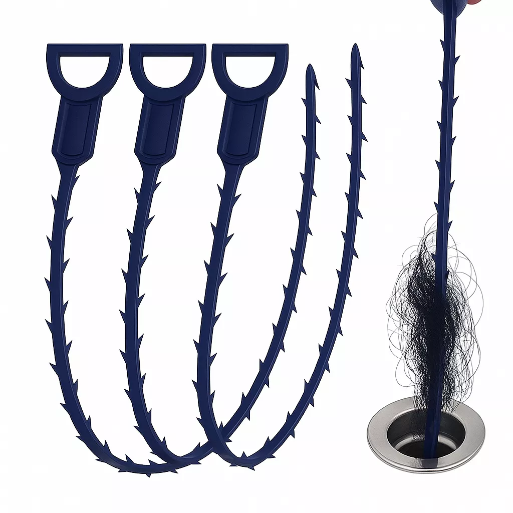 Set of four dark blue plastic drain cleaning tools with barbed edges and ergonomic handles, designed to flexibly remove hair and debris from sink and shower drains. One tool shown extracting hair from a drain.