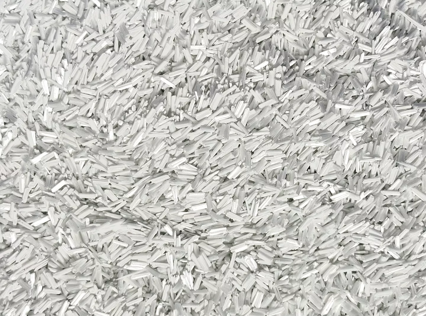 Short glass fibers bring stiffness/strength; ENZ (impact modifiers) add micro 